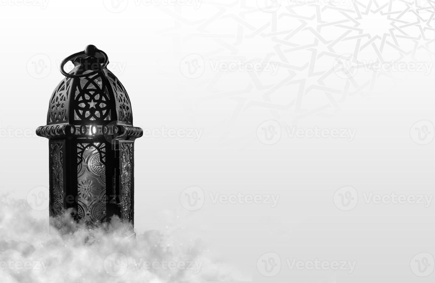 A black lantern with the words'alhambra'on the top left corner .Social media posts .Muslim Holy Month Ramadan Kareem .Ramadan Mubarak beautiful greeting card photo