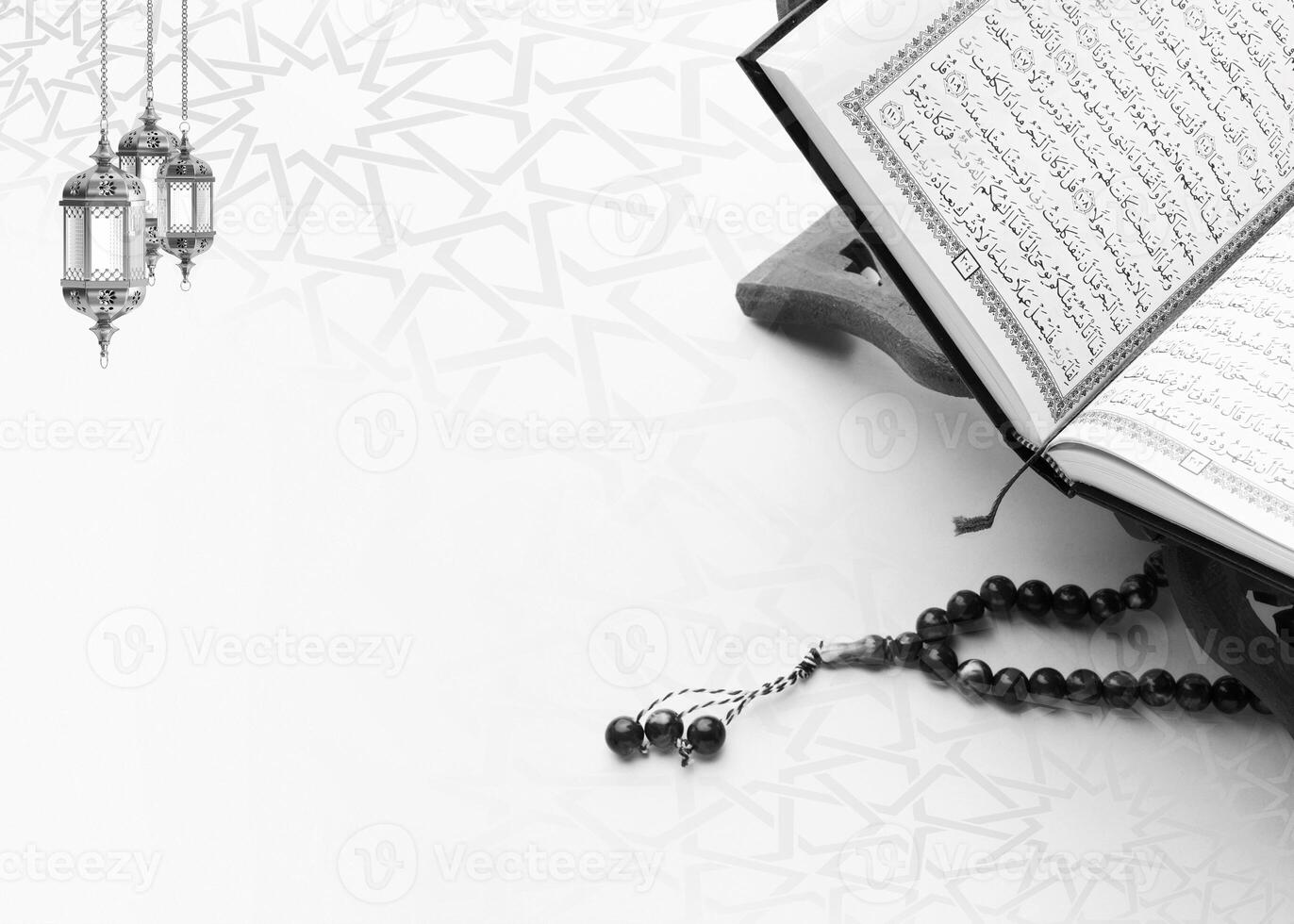 A book of quran with a rosary on the top left with copy space islamic ramadan greeting background . Ramadan Kareem. Islamic greeting template with ramadan for wallpaper design photo