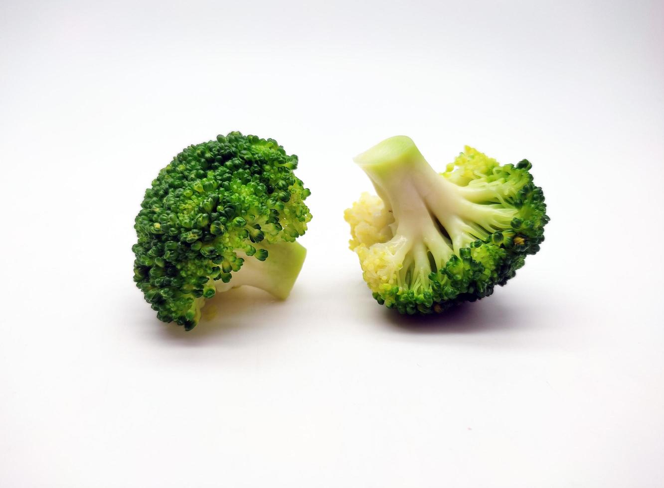 Broccoli collection. Different sides of green fresh broccoli.  Isolated on white background photo
