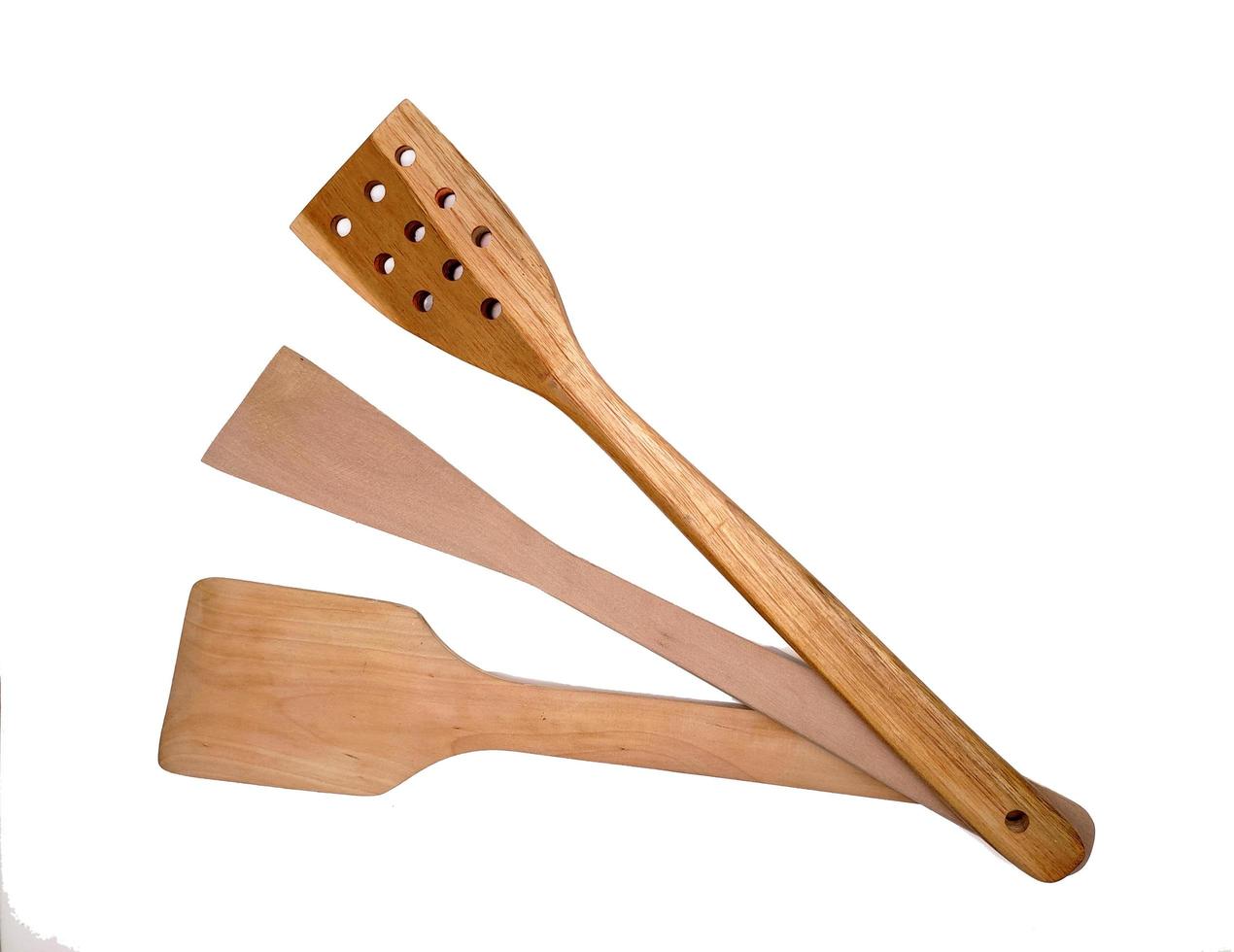 Wooden spatula isolated in white background photo