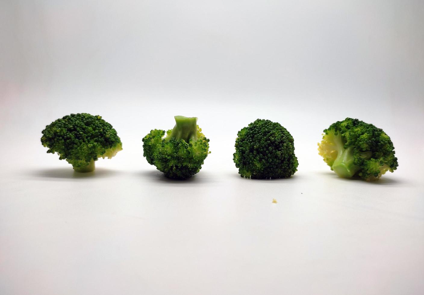 Broccoli collection. Different sides of green fresh broccoli.  Isolated on white background photo