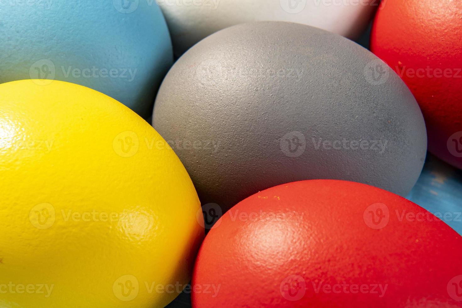 eggs painted in different colors to symbolize the passage of Christian
