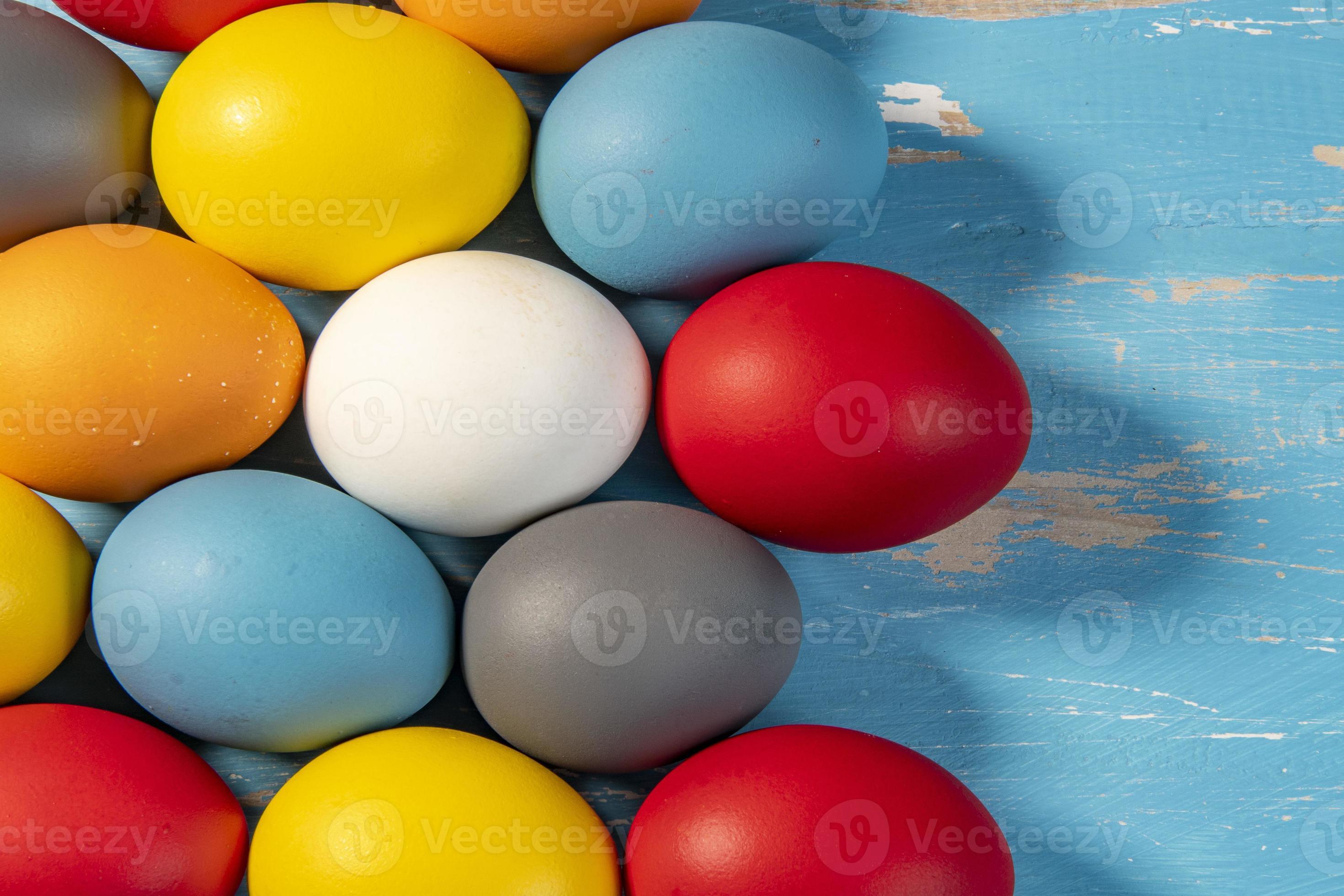 eggs painted in different colors to symbolize the passage of Christian