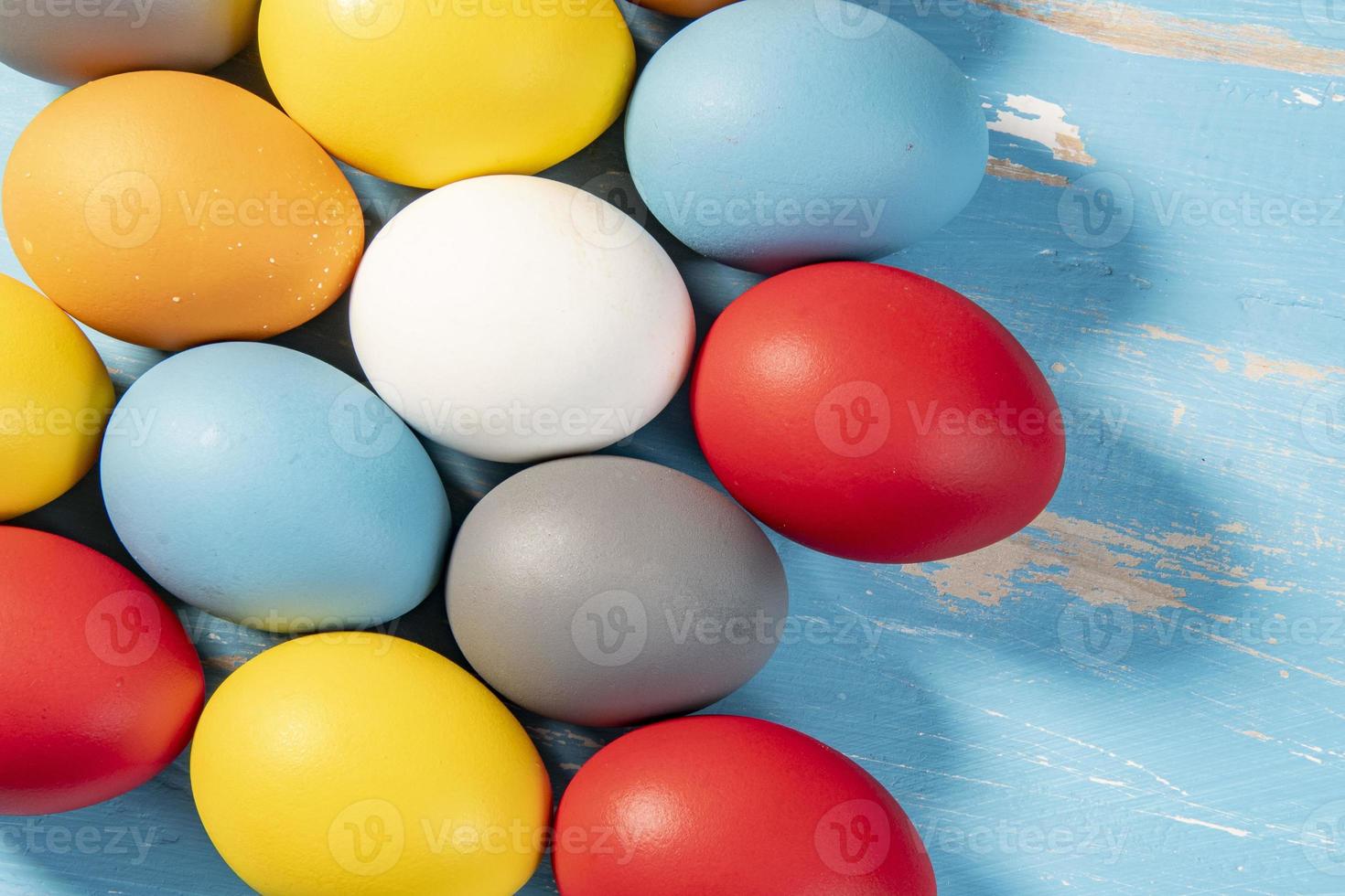 eggs painted in different colors to symbolize the passage of Christian