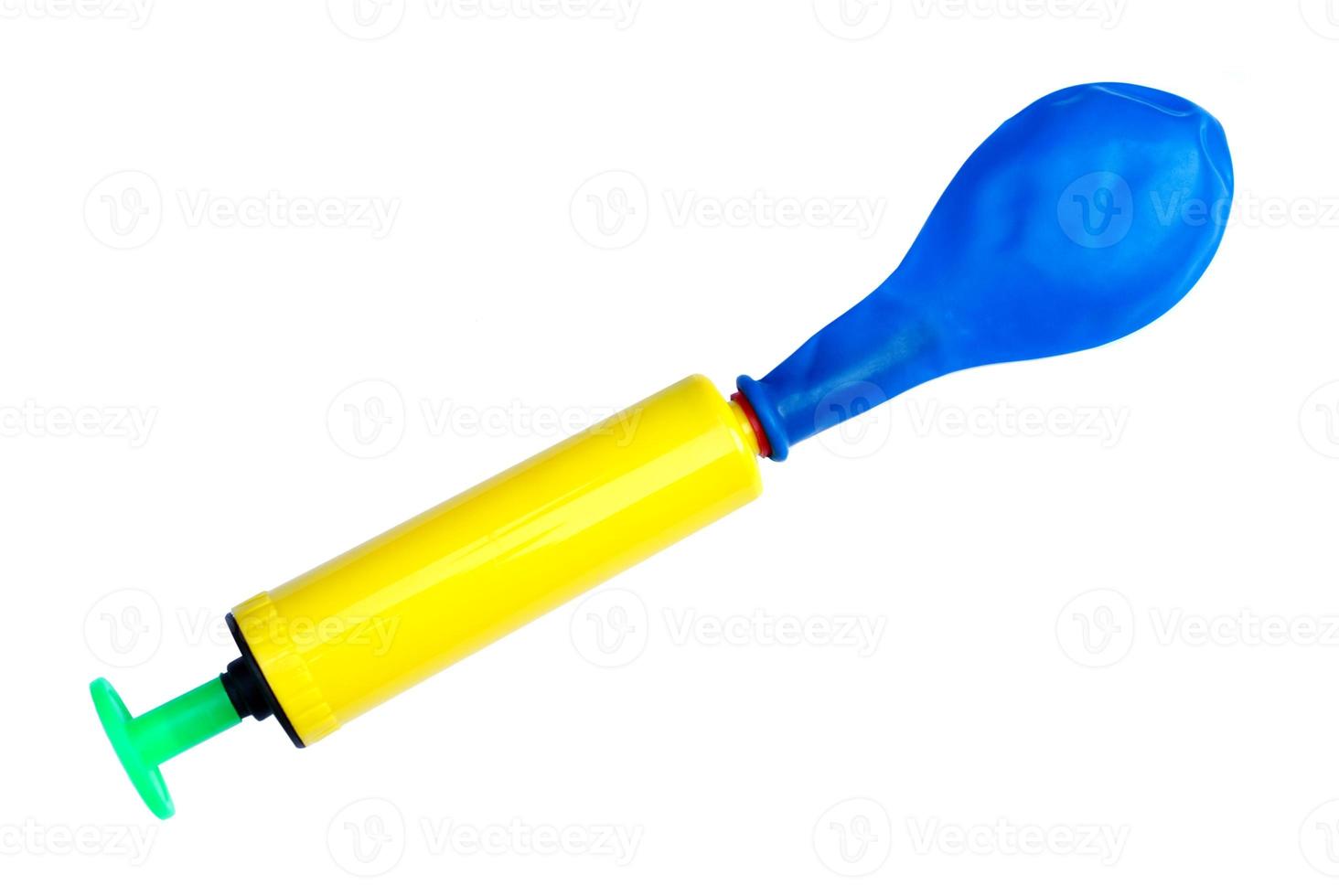 Colorful balloon air pump, inflates  air to balloon, isolated on white background. Concept, toy and equipment to play fun games or prepare party. photo
