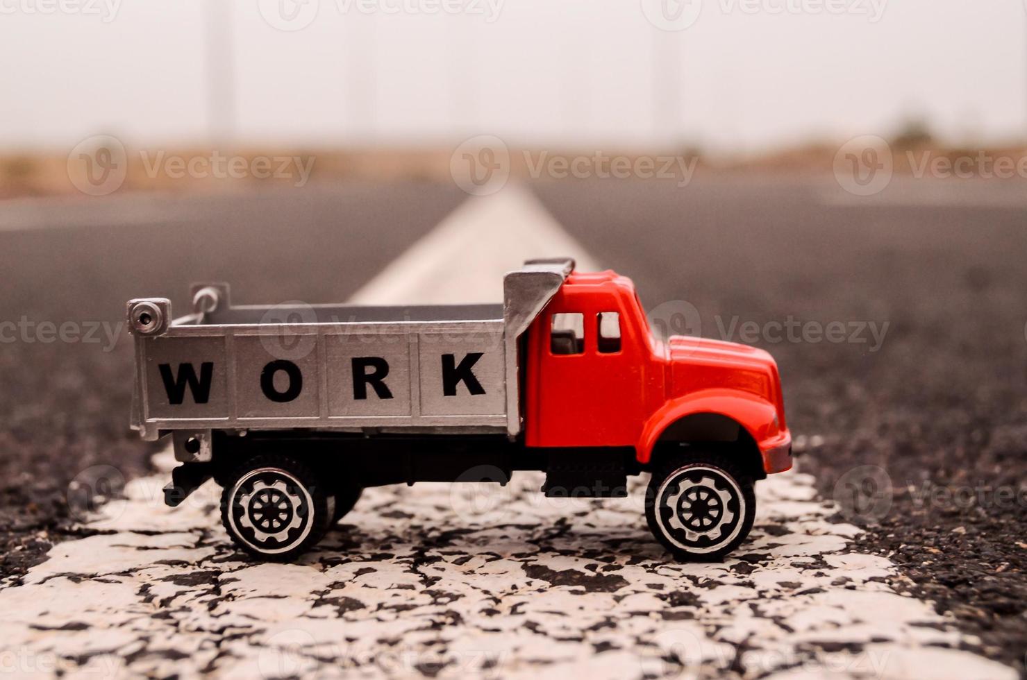 Toy truck on the road photo