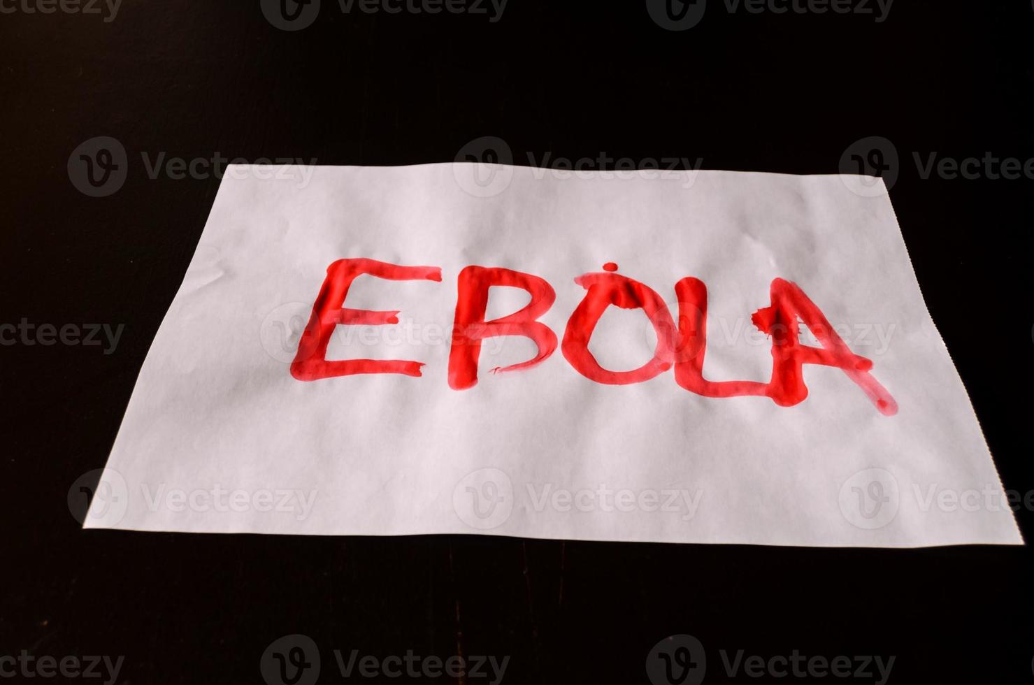 Ebola written on paper photo