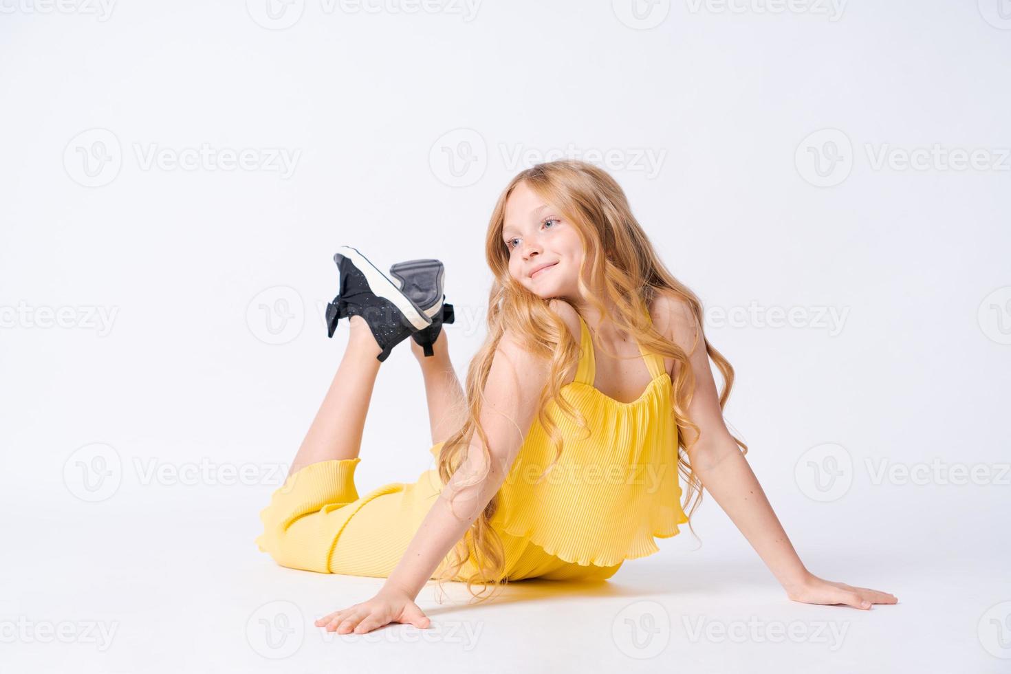 Fashion Studio Teen Style Style in shoes. Fashionable young girl wears summer photo