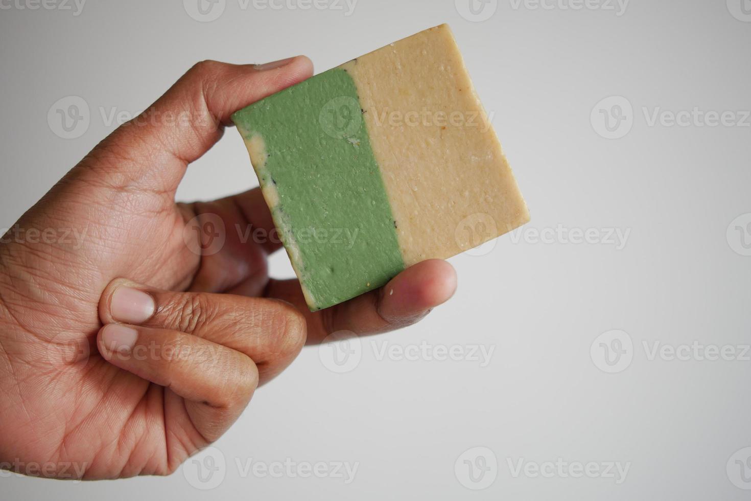 holding a natural soap bar photo