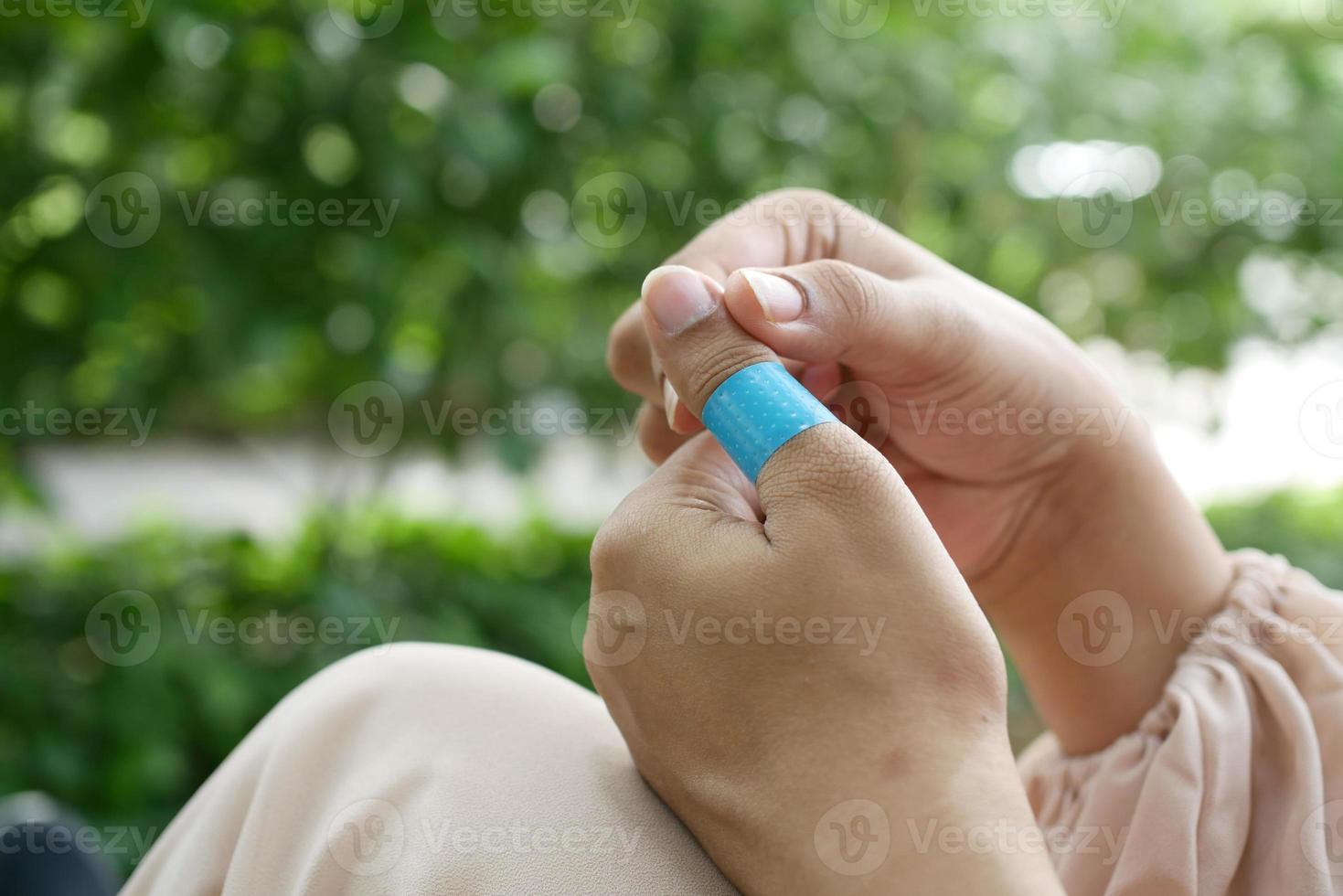 adhesive bandage on hand close up photo