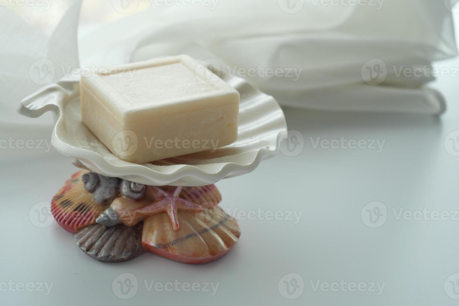 white color natural soap bar on table photo