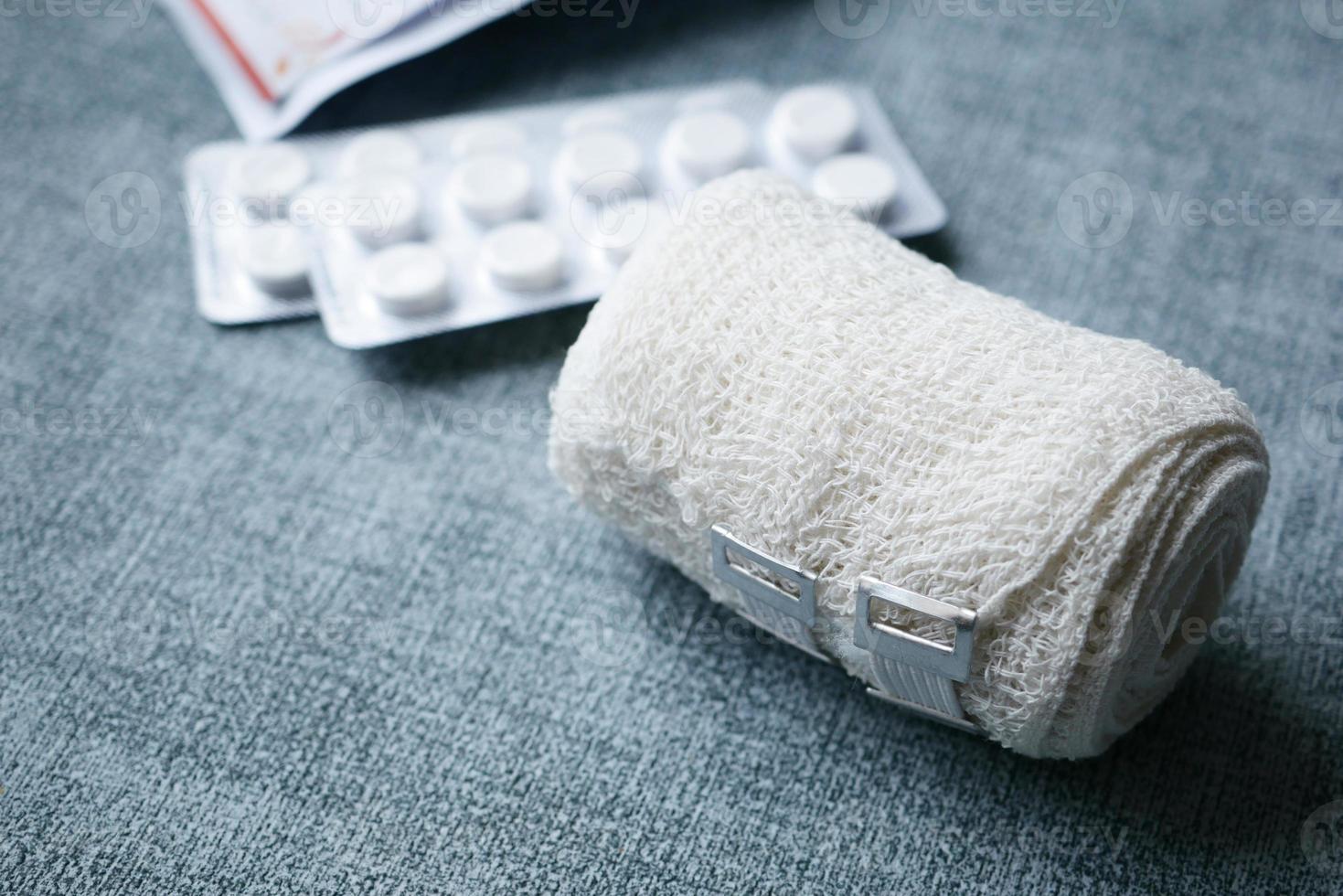 adhesive bandage and a bag on table photo