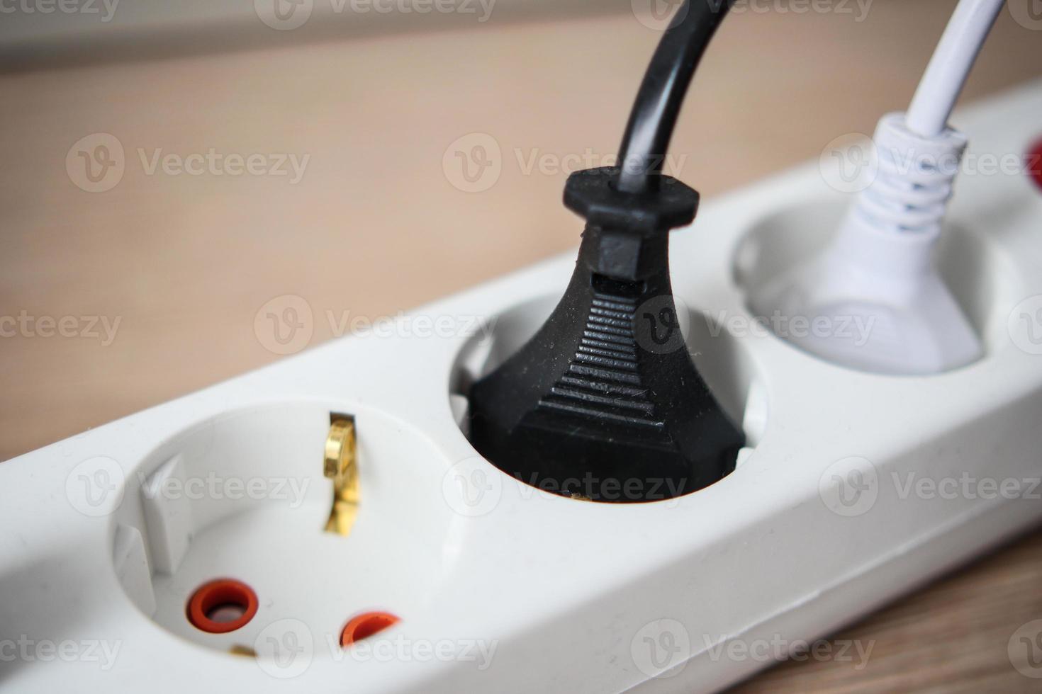 Electrical switch and plug on table photo