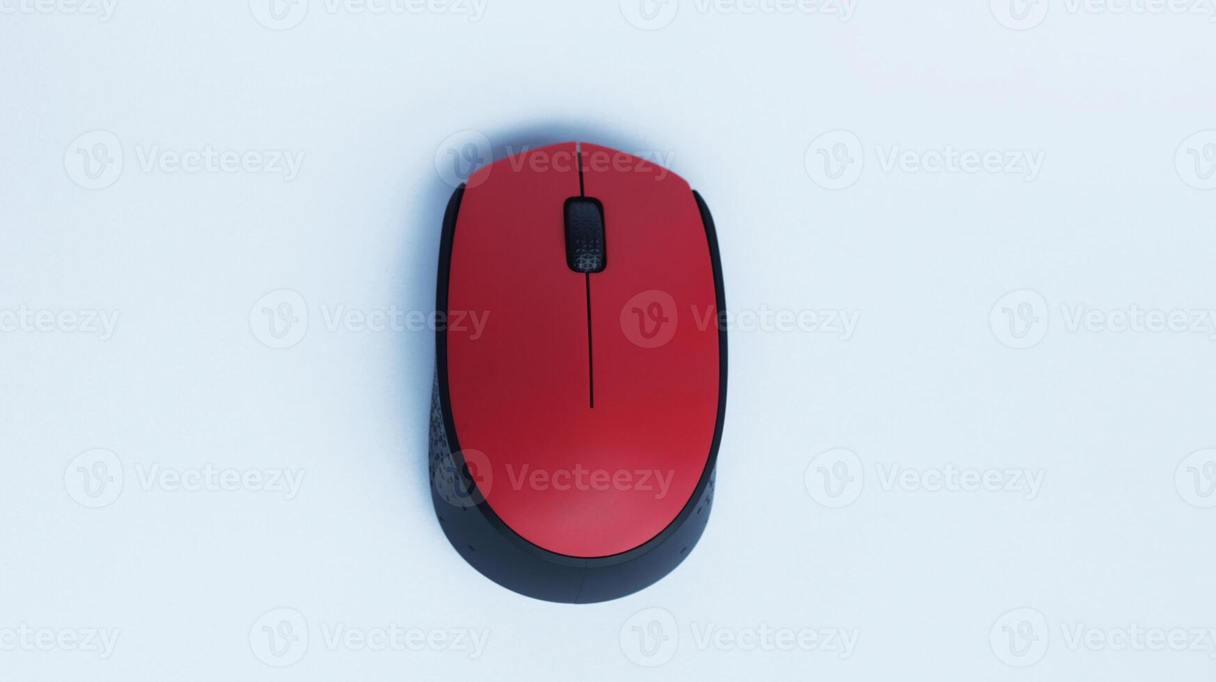 Simple red mouse computer accessories wireless isolated on white. photo