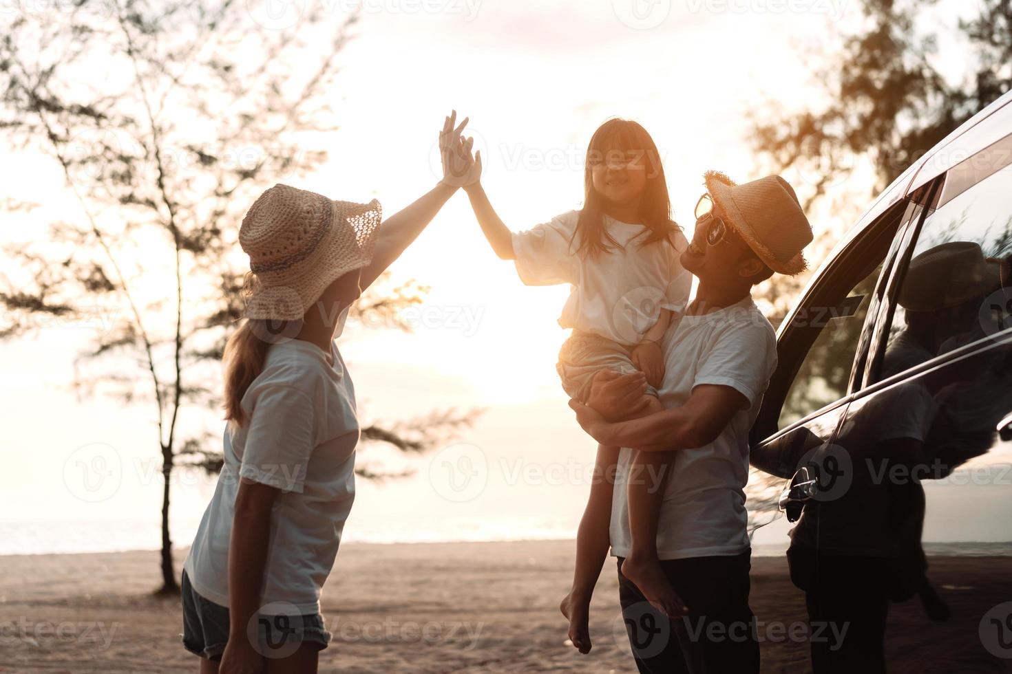 Family with Car travel driving road trip summer vacation in car in the sunset, Dad, mom and daughter happy traveling enjoy holidays and relaxation together get the atmosphere and go to destination photo