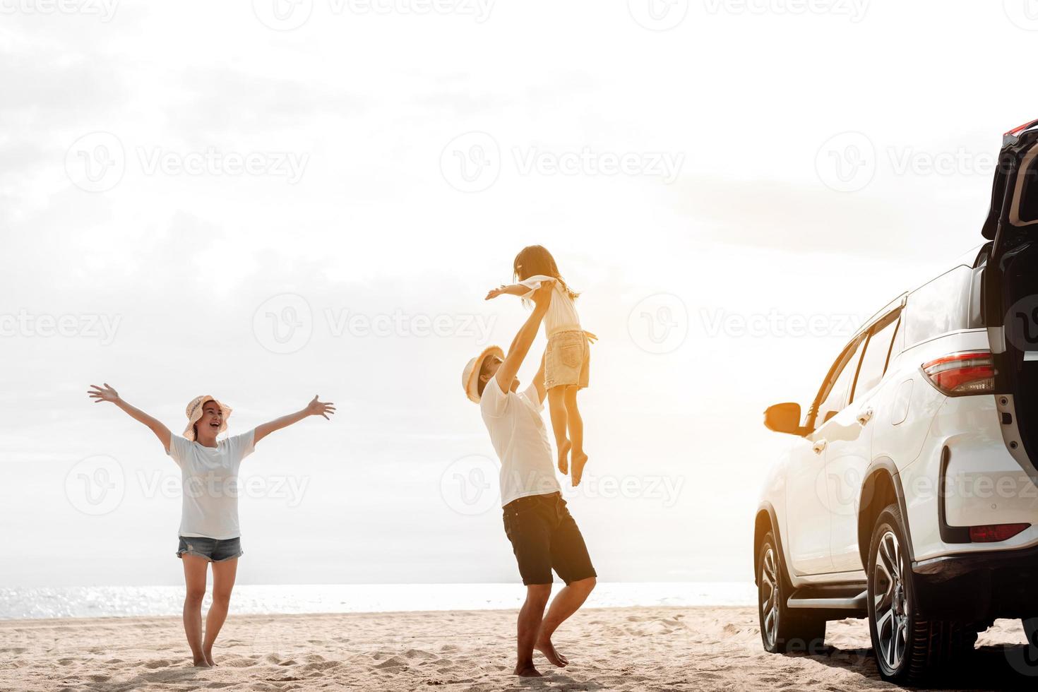 Happy Family with car travel road trip. summer vacation in car in the sunset, Dad, mom and daughter happy traveling enjoy together driving in holidays, people lifestyle ride by automobile. photo