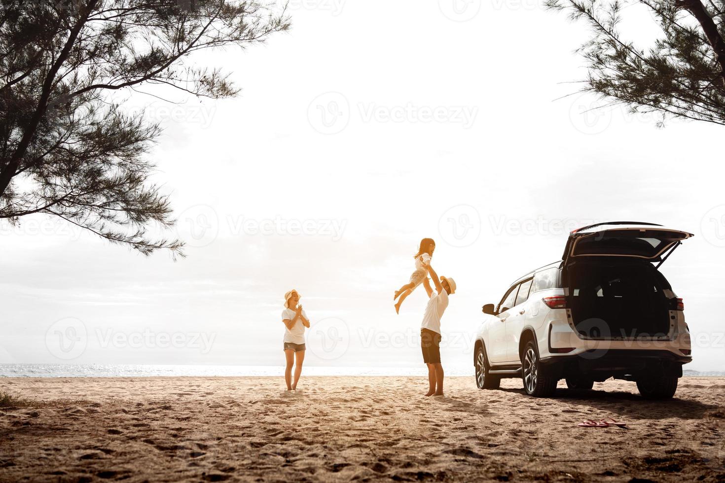 Happy Family with car travel road trip. summer vacation in car in the sunset, Dad, mom and daughter happy traveling enjoy together driving in holidays, people lifestyle ride by automobile. photo