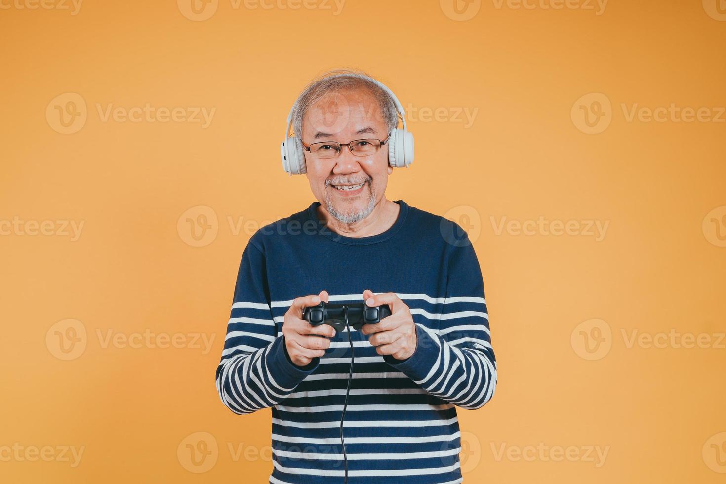 Asian Senior older man family having fun enjoying play video game funny video. Happiness lifestyle on retirement concepts. photo