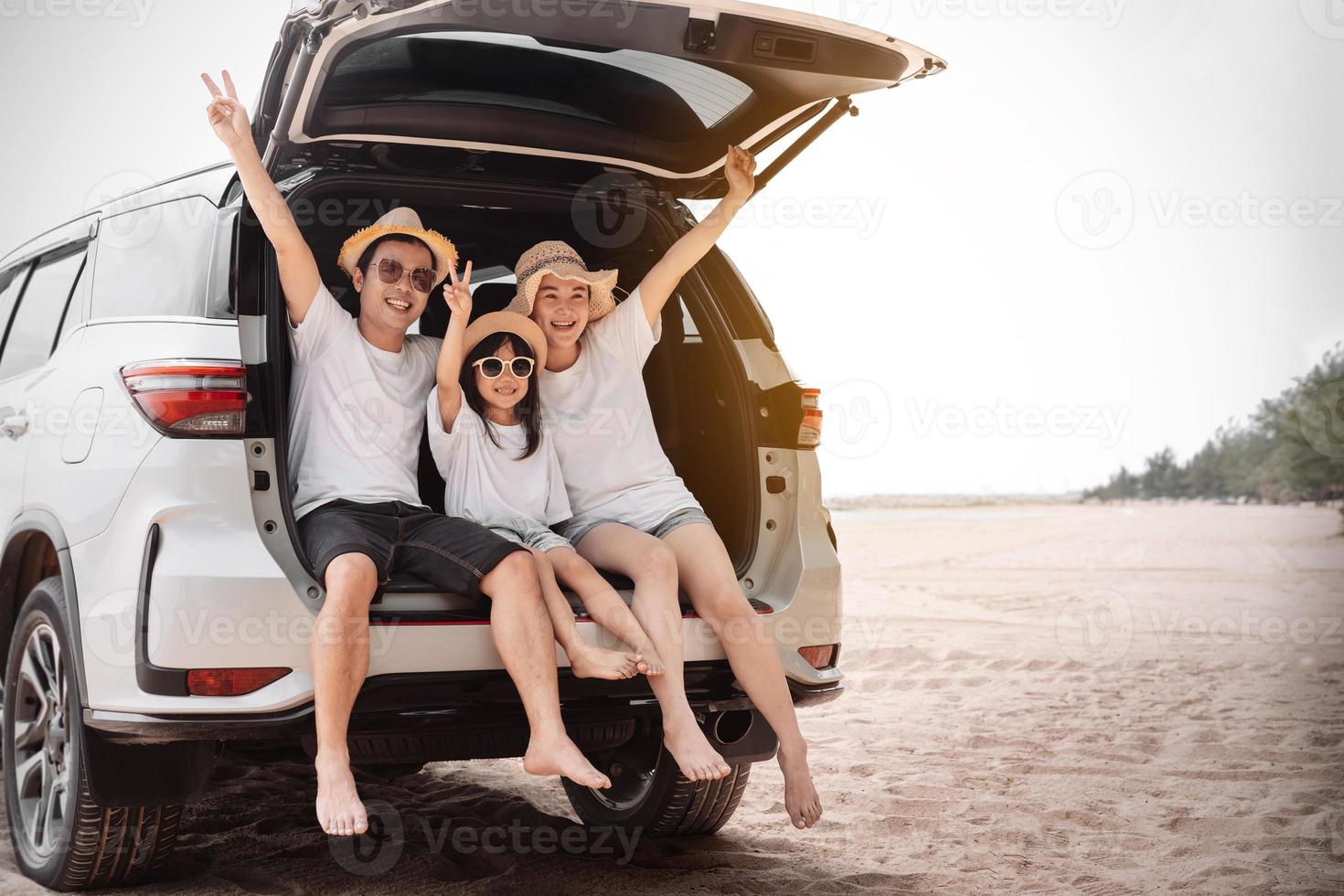 Family with Car travel driving road trip summer vacation in car in the sunset, Dad, mom and daughter happy traveling enjoy holidays and relaxation together get the atmosphere and go to destination photo