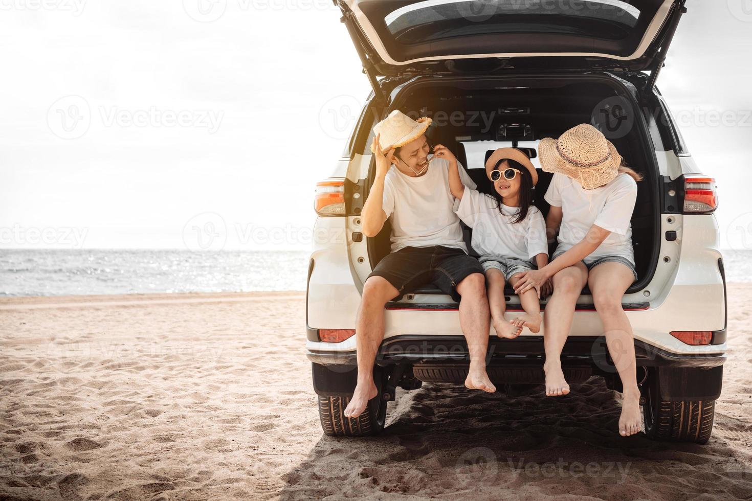 Family with Car travel driving road trip summer vacation in car in the sunset, Dad, mom and daughter happy traveling enjoy holidays and relaxation together get the atmosphere and go to destination photo