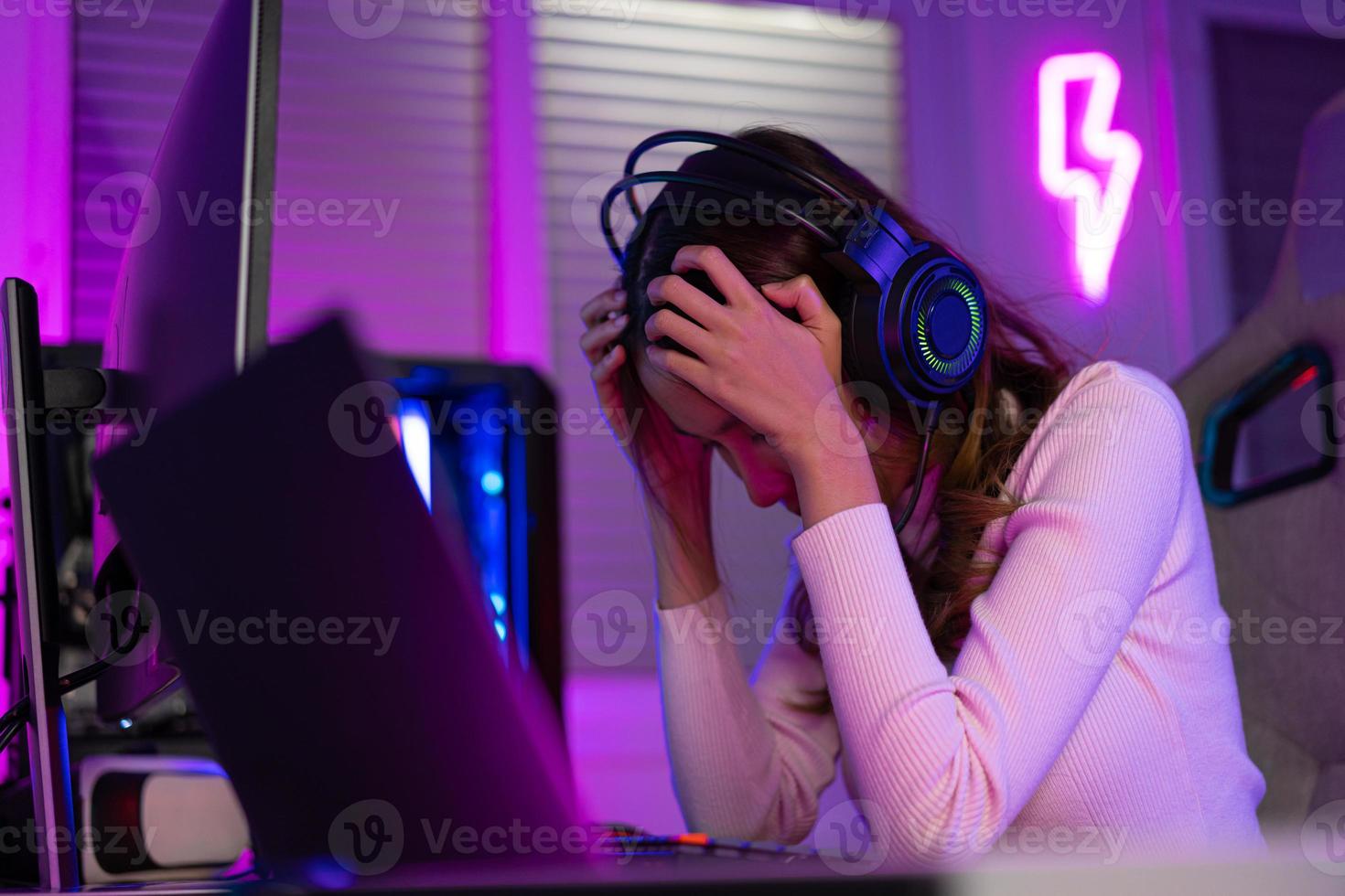 Premium Photo  Man feeling disapointed about losing video games on  computer. gamer with headphones using controller and playing online games  on monitor. sad player lost cyber game competition.