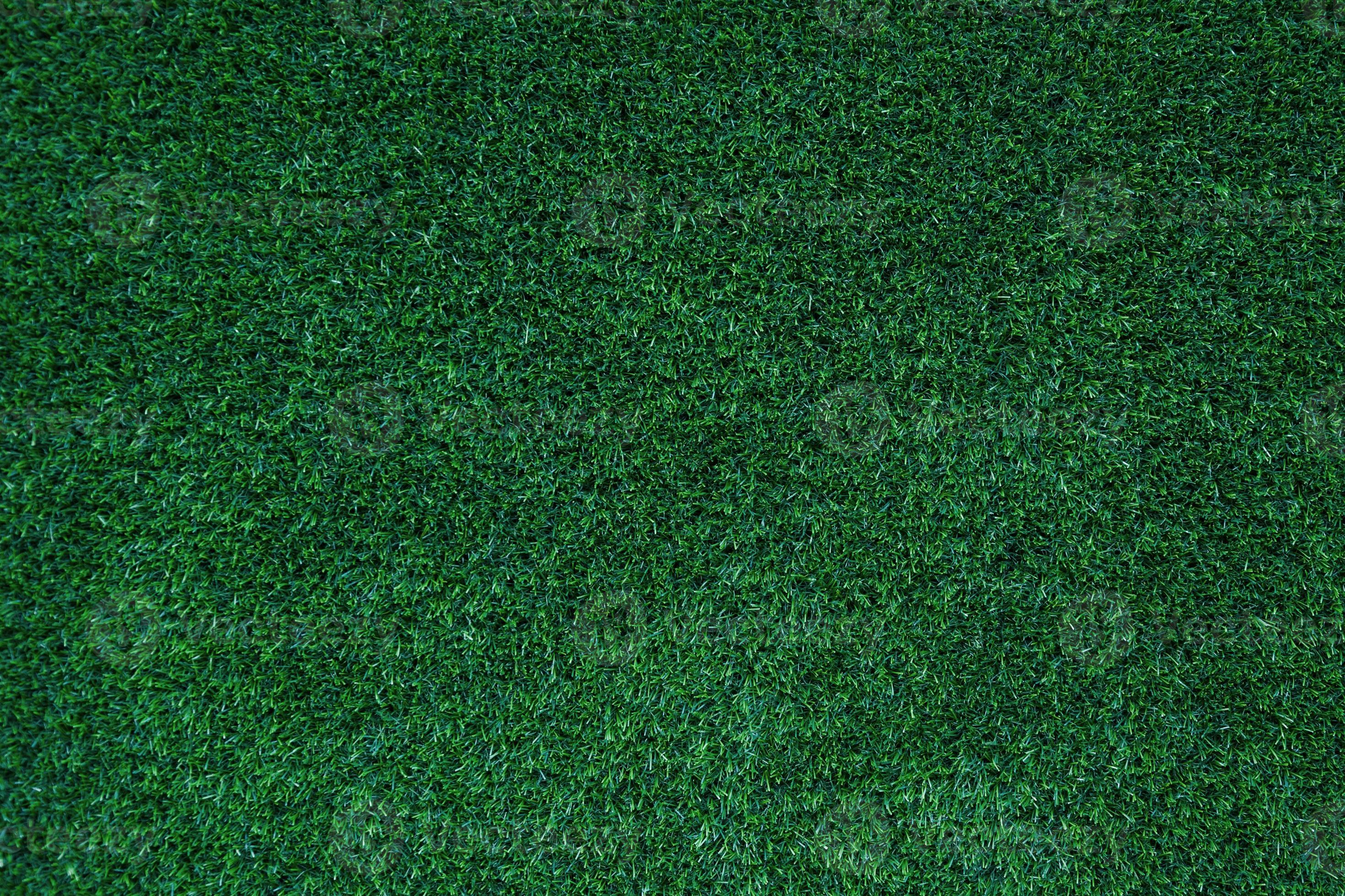 Abstract green grass football field of artificial grass background
