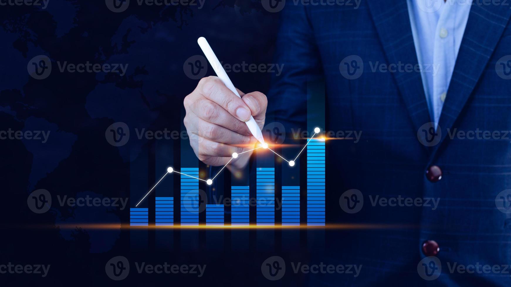 Businessman stylus pen touch points symbol stock graph and chart background, concept growth and development business investment, Stock market and strategy making market plan photo