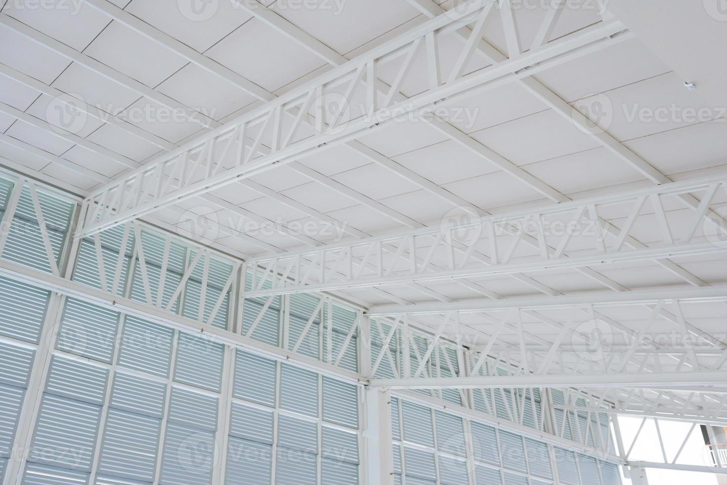 Large steel structure truss, roof frame and metal sheet in building construction site photo