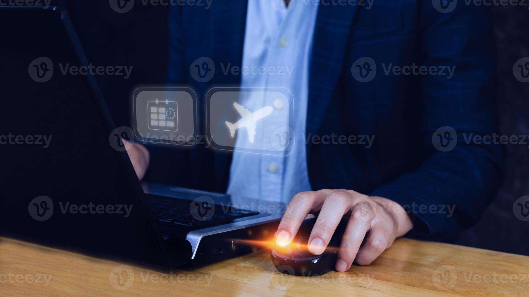 Businessman pointing finger touching to select flight by pressing touch screen airplane button,Business Airplane transportation concept photo