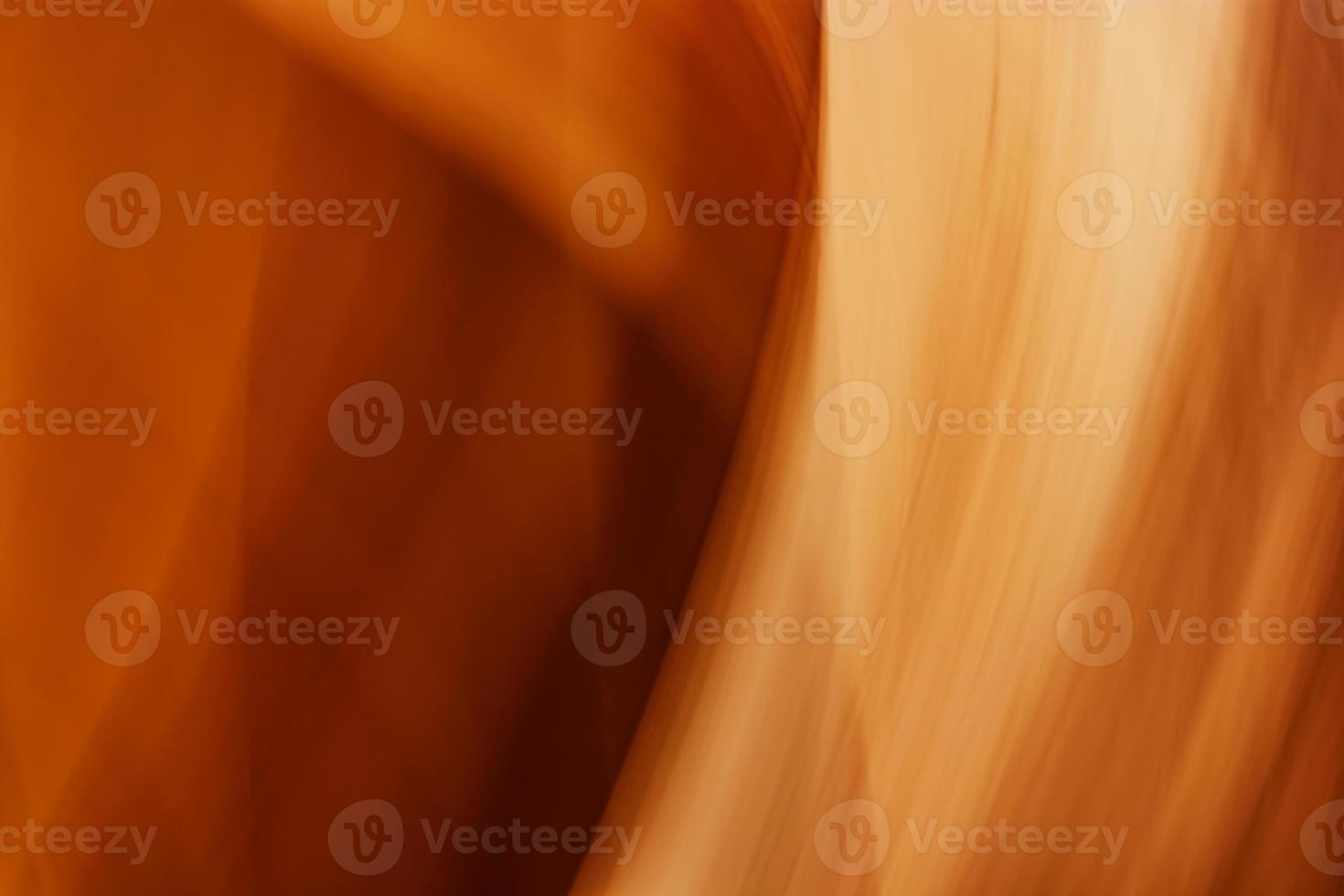 Abstract orange background with some smooth lines in it. photo