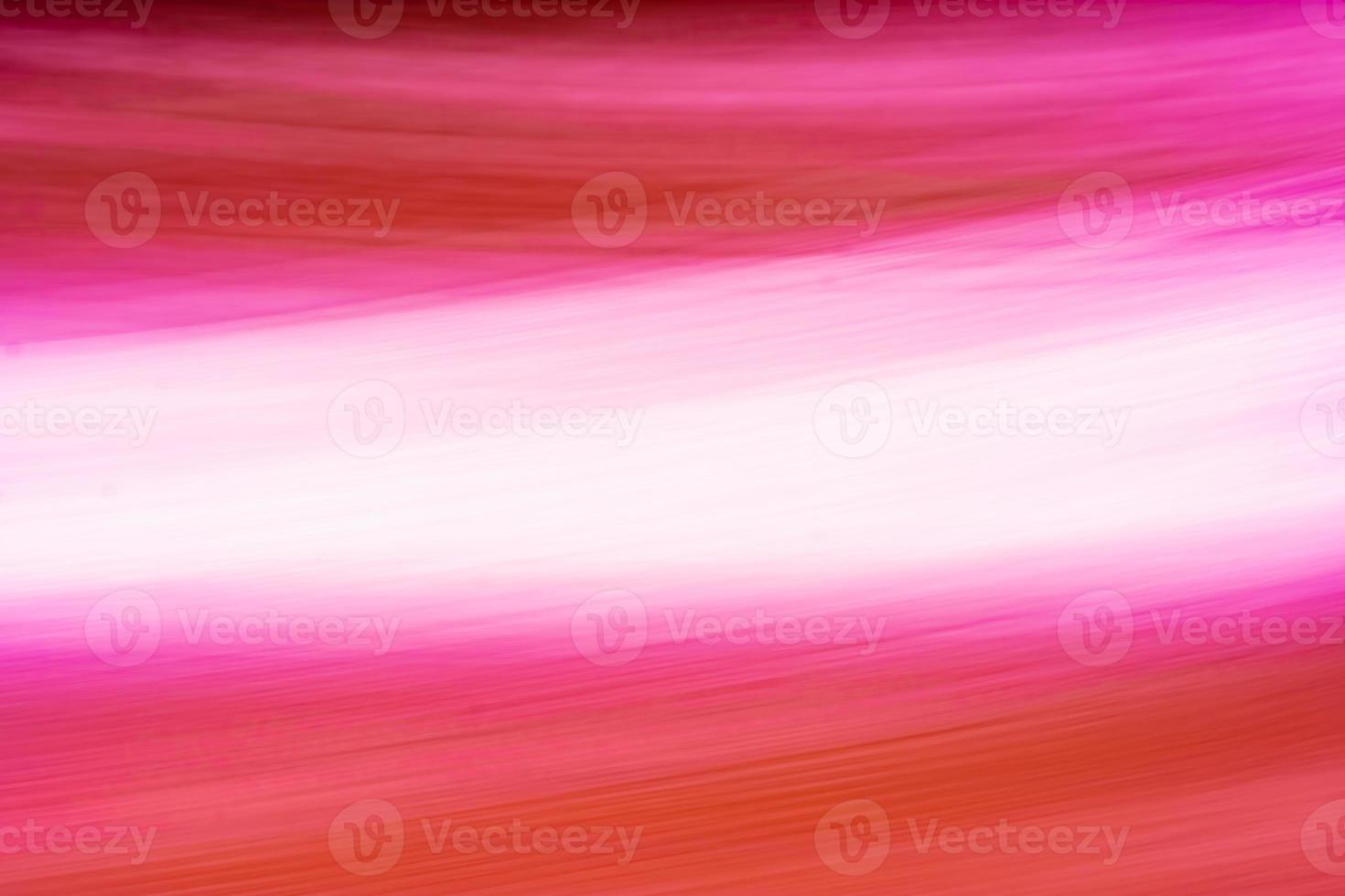 Abstract background with red and pink diagonal stripes. photo