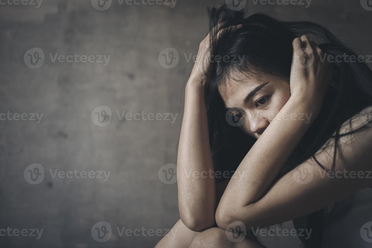 Young depressed woman, domestic violence and rape. stop abusing violence,  human trafficking, stop violence against women, Human is not a product. Stop women abuse, Human rights violations. photo