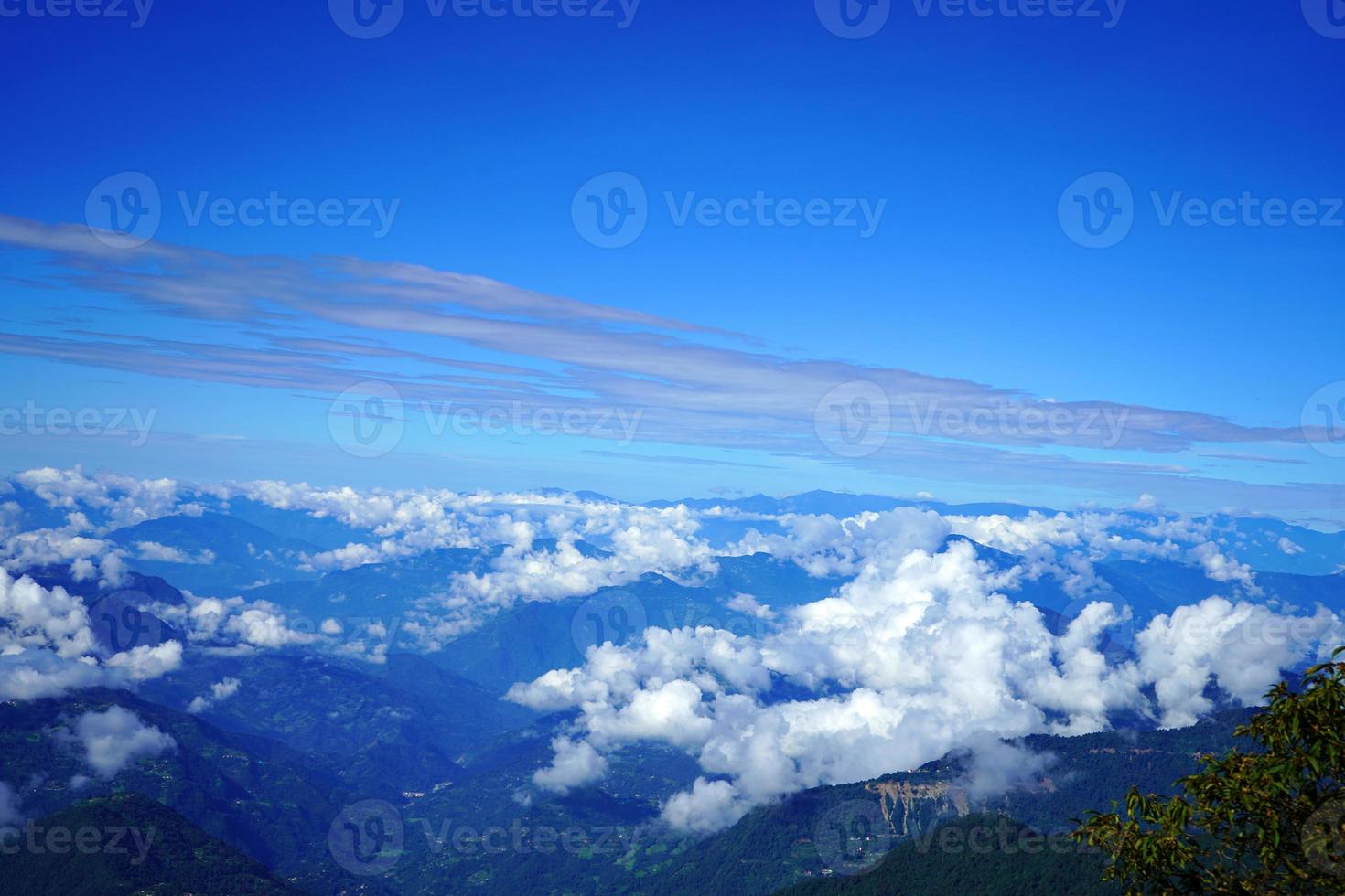 Himalayan Range Skyline with Floating Clouds photo