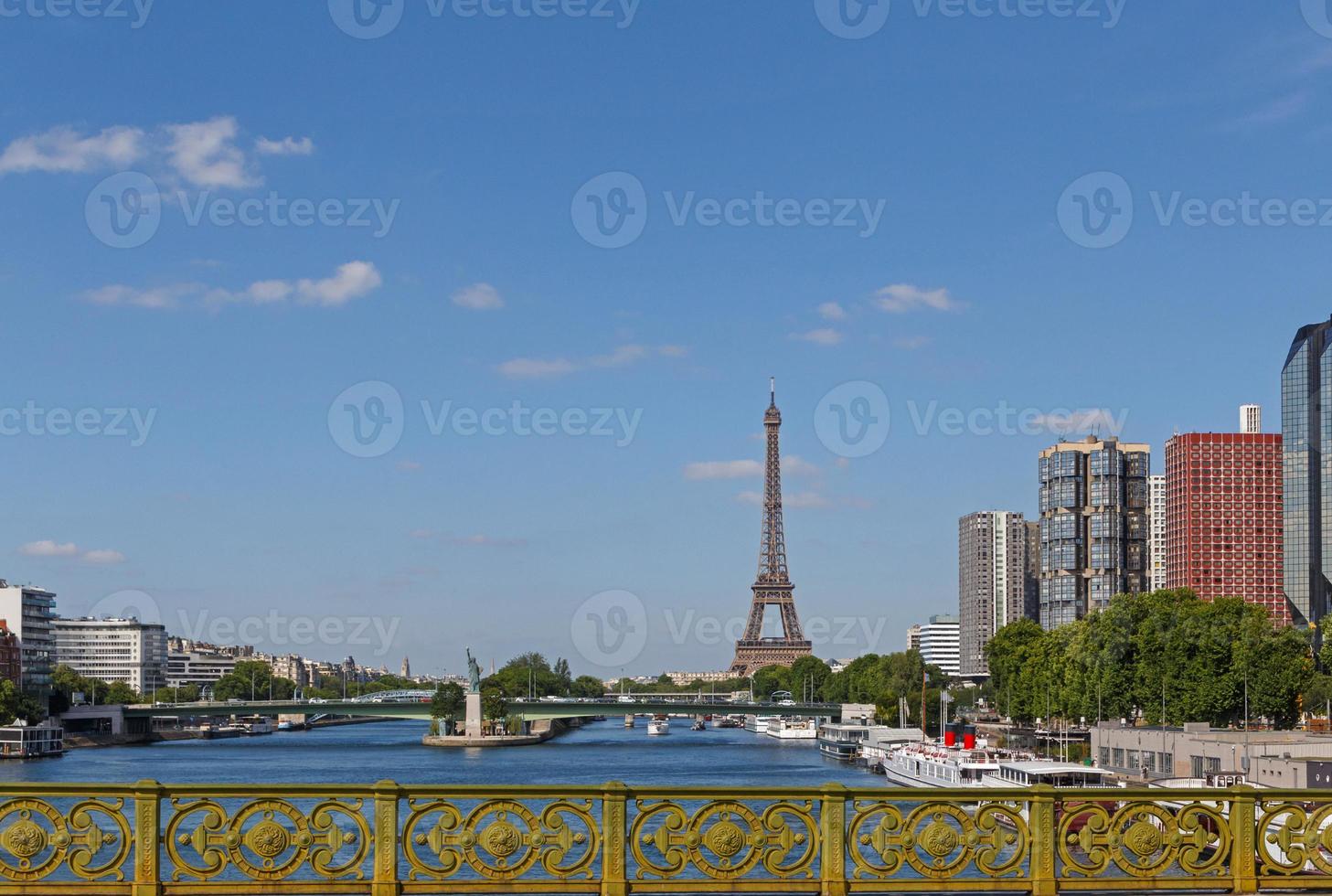 view on Eiffel tower and statue of Liberty from Pont Mirabeau photo