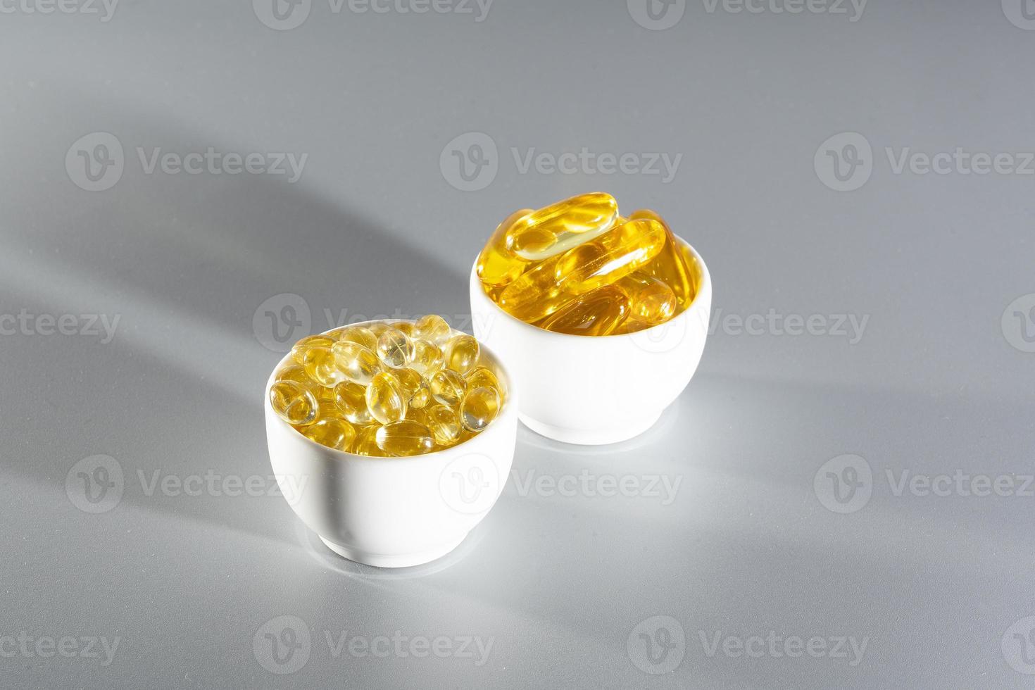 Vitamin D, omega 3, omega 6, Food supplement oil filled fish oil, vitamin A, vitamin E, flaxseed oil. photo