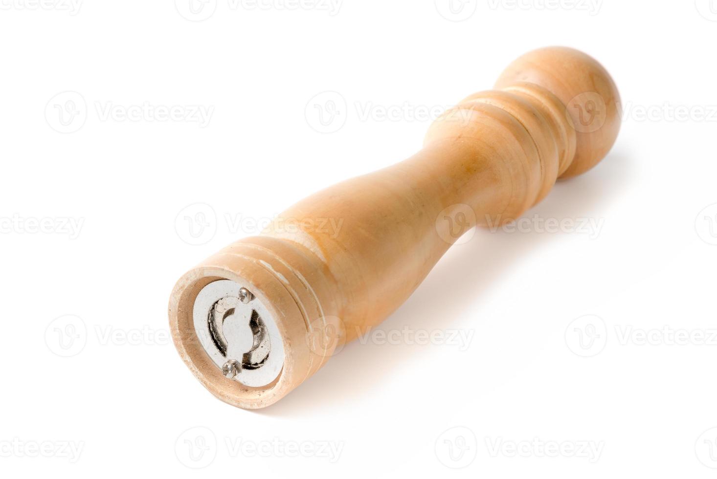 Wood Pepper Mill isolated on white background photo