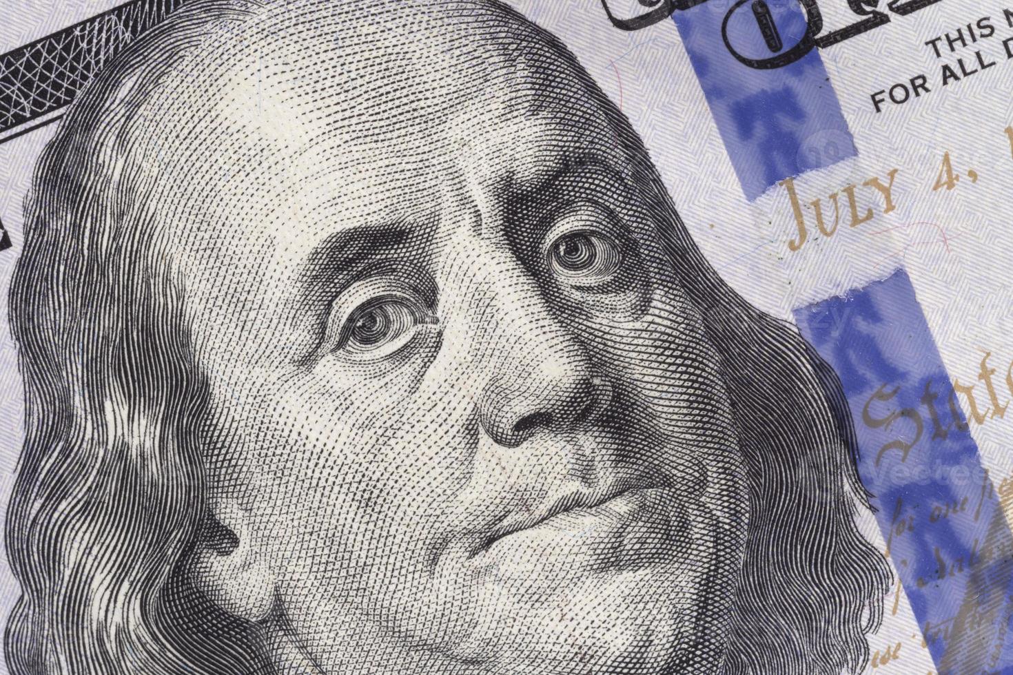 close up of Franklin on one hundred US dollars banknote photo