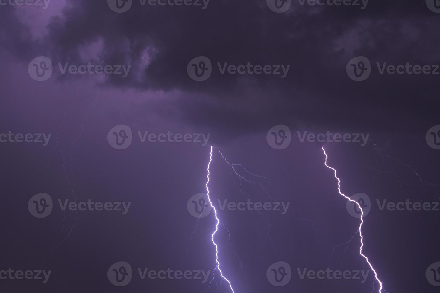 night sky with two strokes of lightning photo