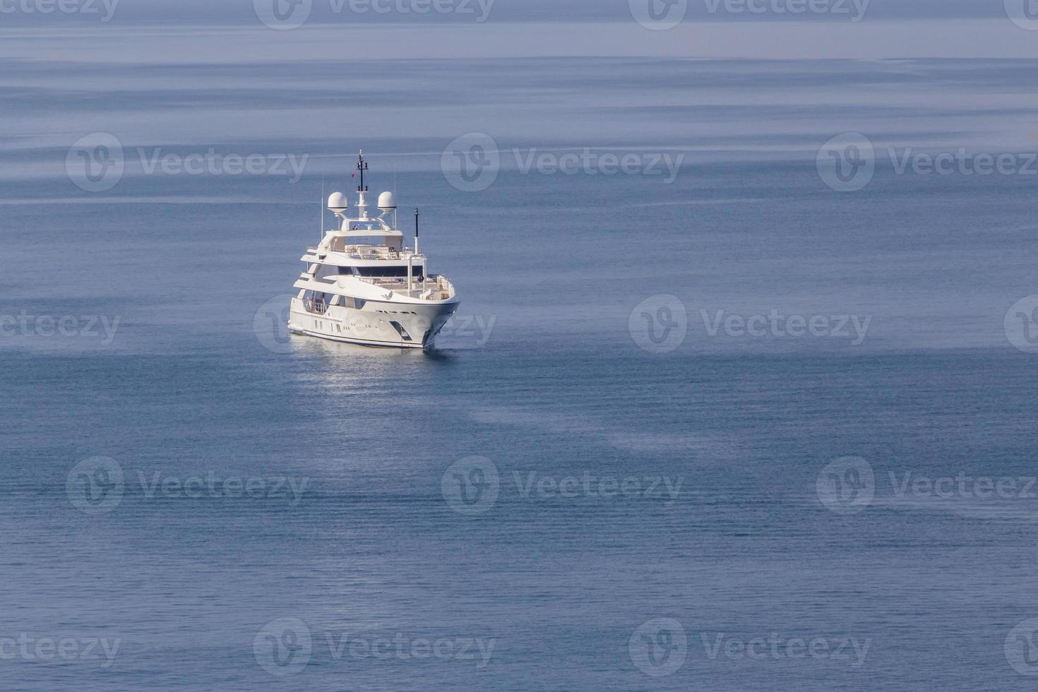 view on white speed yacht in sea photo