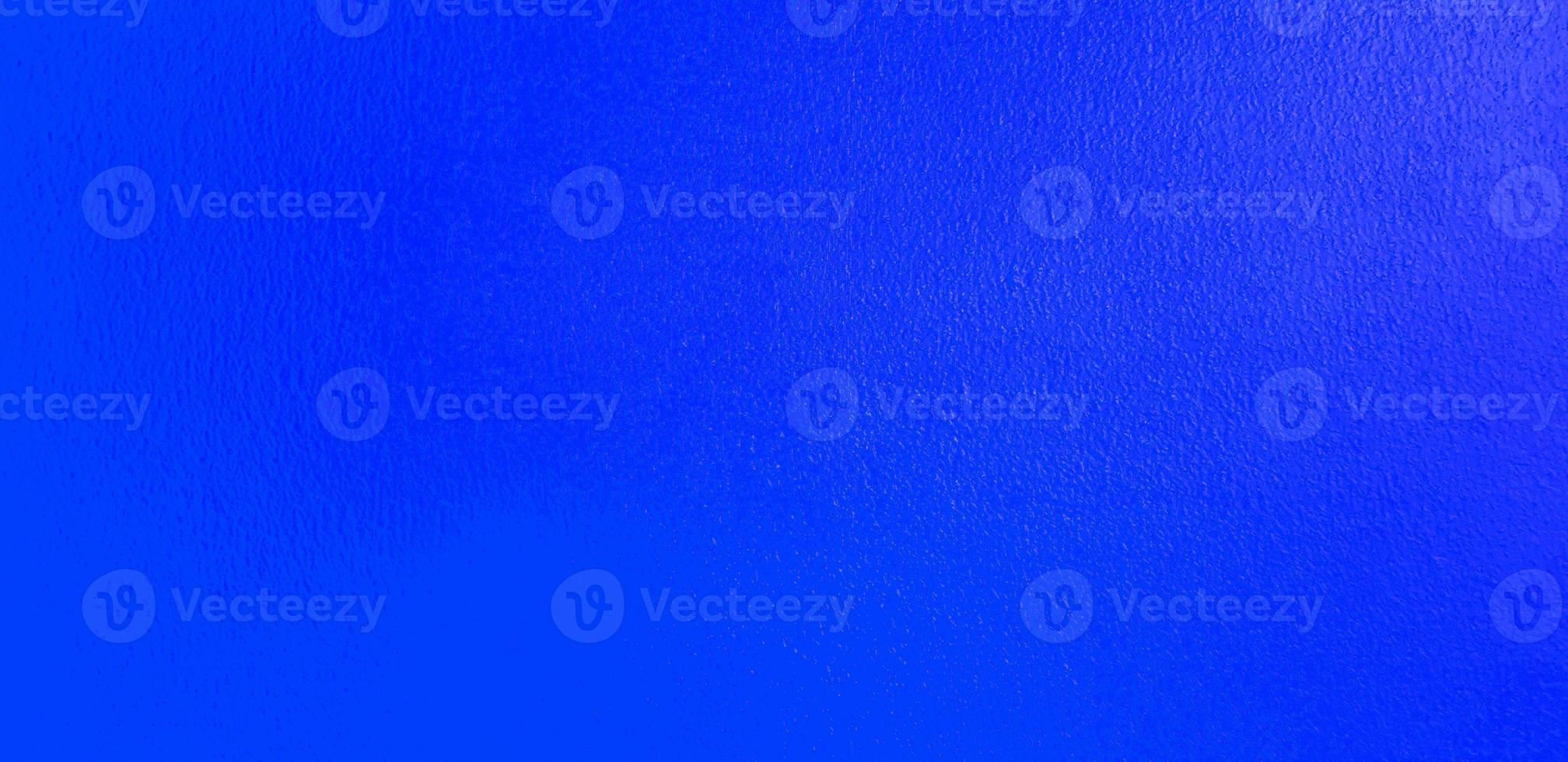 Blue concrete wall for background. Painted brickwork or colorful or pastell rough wallpaper. Exterior design in loft style concept. photo