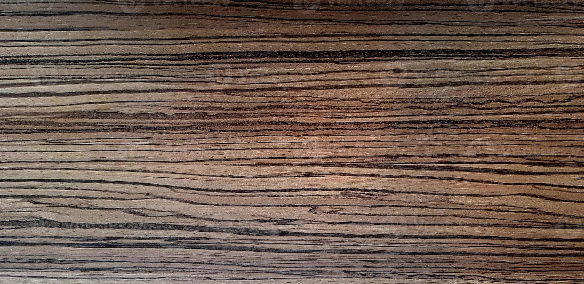 Pattern of dark brown wooden table or floor for background. Wood material, Abstract Wallpaper and Surface concept. photo