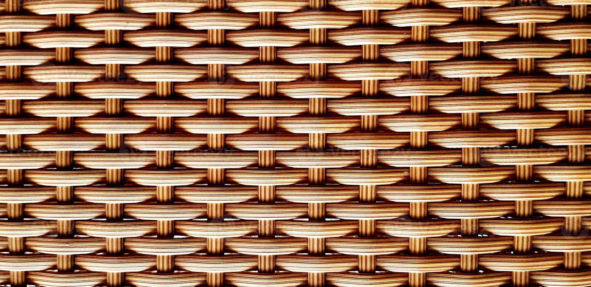 Pattern and texture of brown weave table for background. Natural material, Surface, Art wallpaper and Seamless concept photo