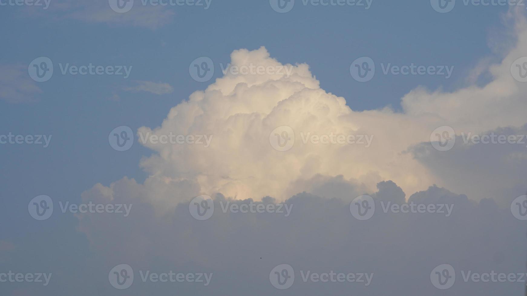 white clouds in the blue sky photo