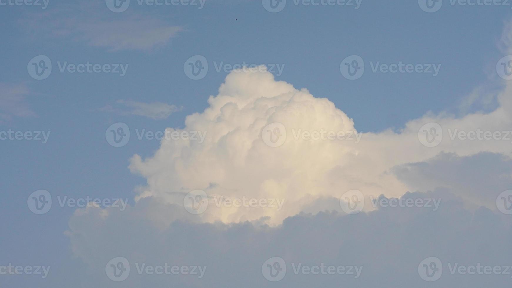 white clouds in the blue sky photo