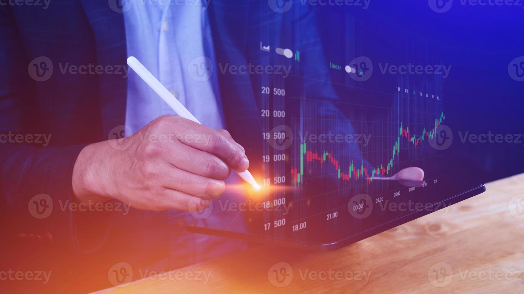 Businessman stylus pen touch points symbol stock graph and chart background, concept growth and development business investment, Stock market and strategy making market plan photo