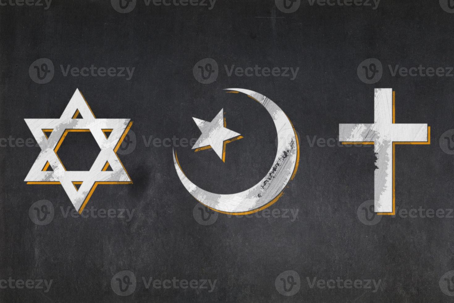 Abrahamic religion symbols drawn on a blackboard photo