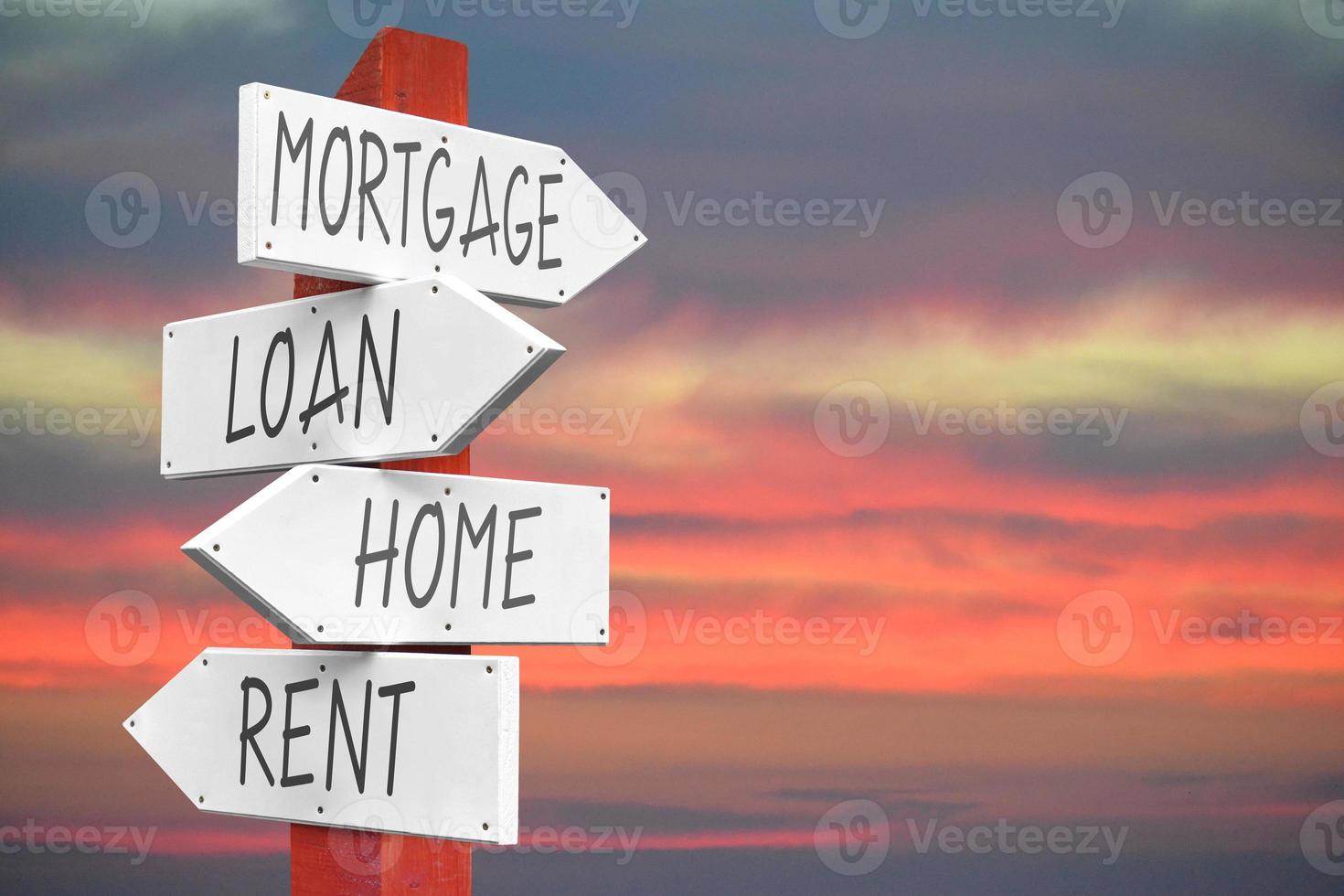 Mortgage, Loan, Home, Rent - Wooden Signpost with Four Arrows photo