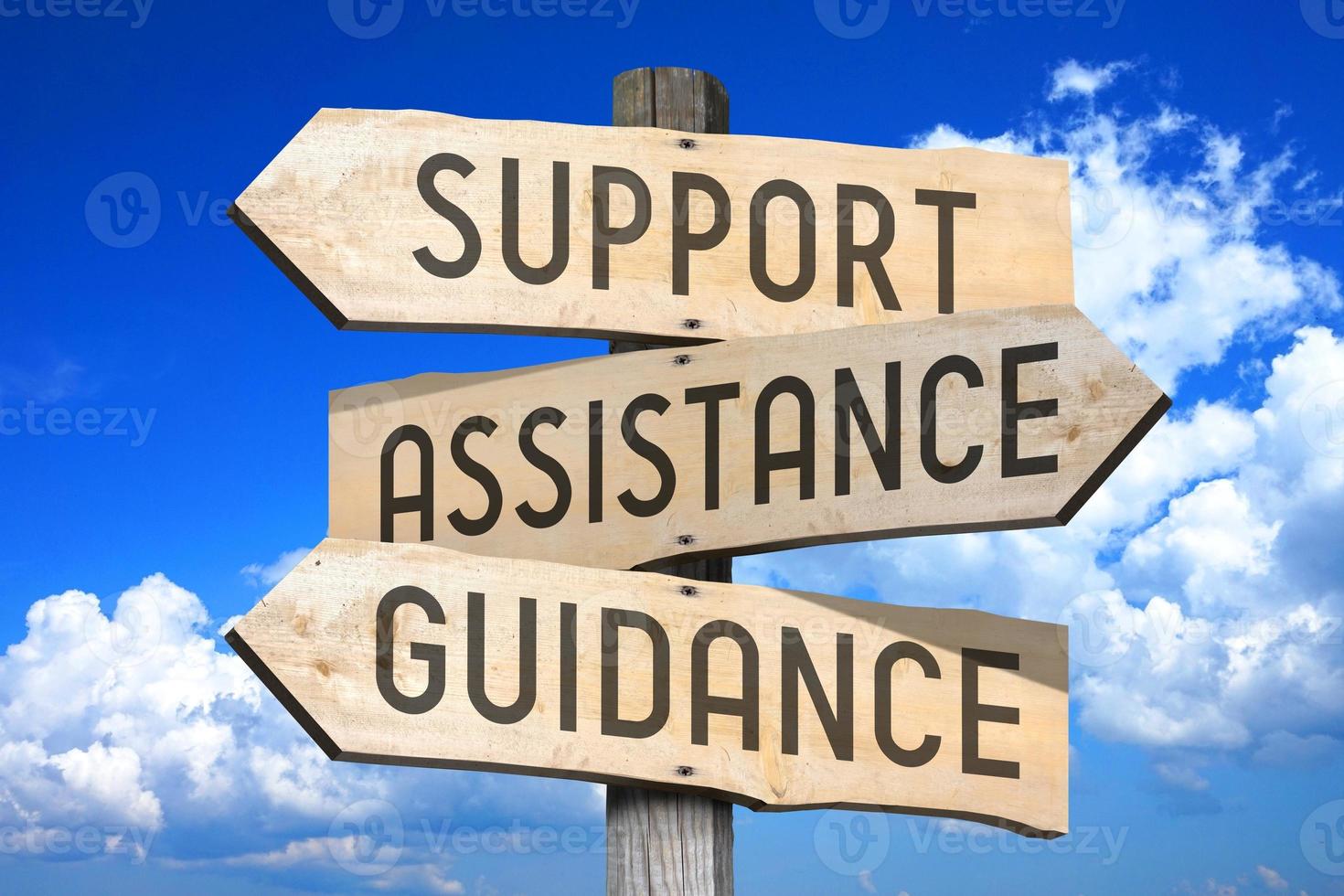 Support, Assistance, Guidance - Wooden Signpost with Three Arrows photo