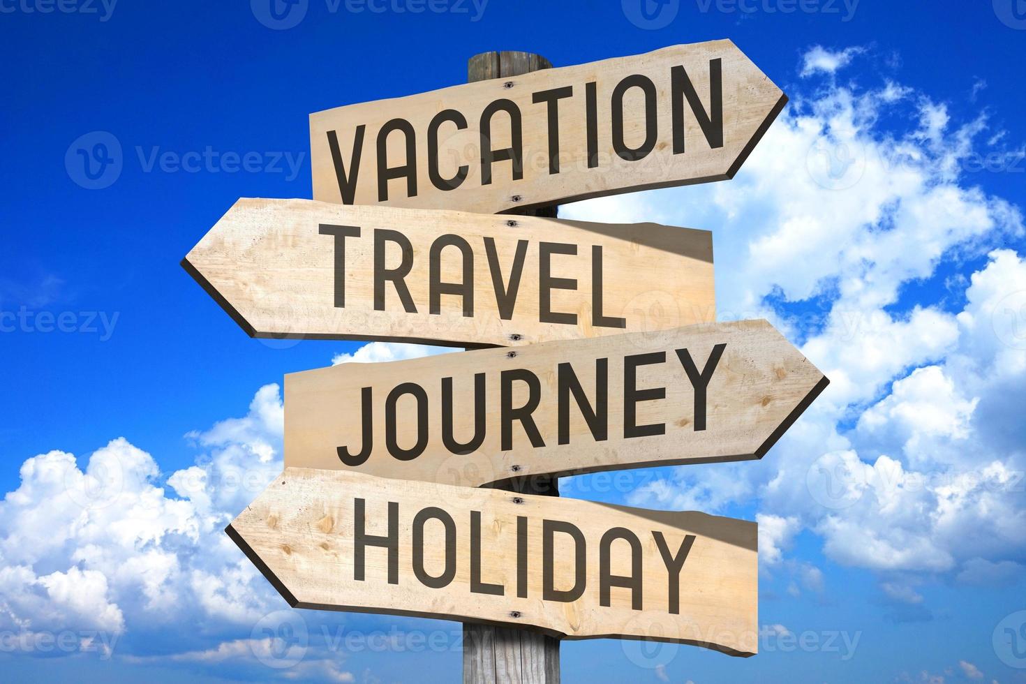 Vacation, Travel, Journey, Holiday - Wooden Signpost with Four Arrows, Sky with Clouds in Background photo