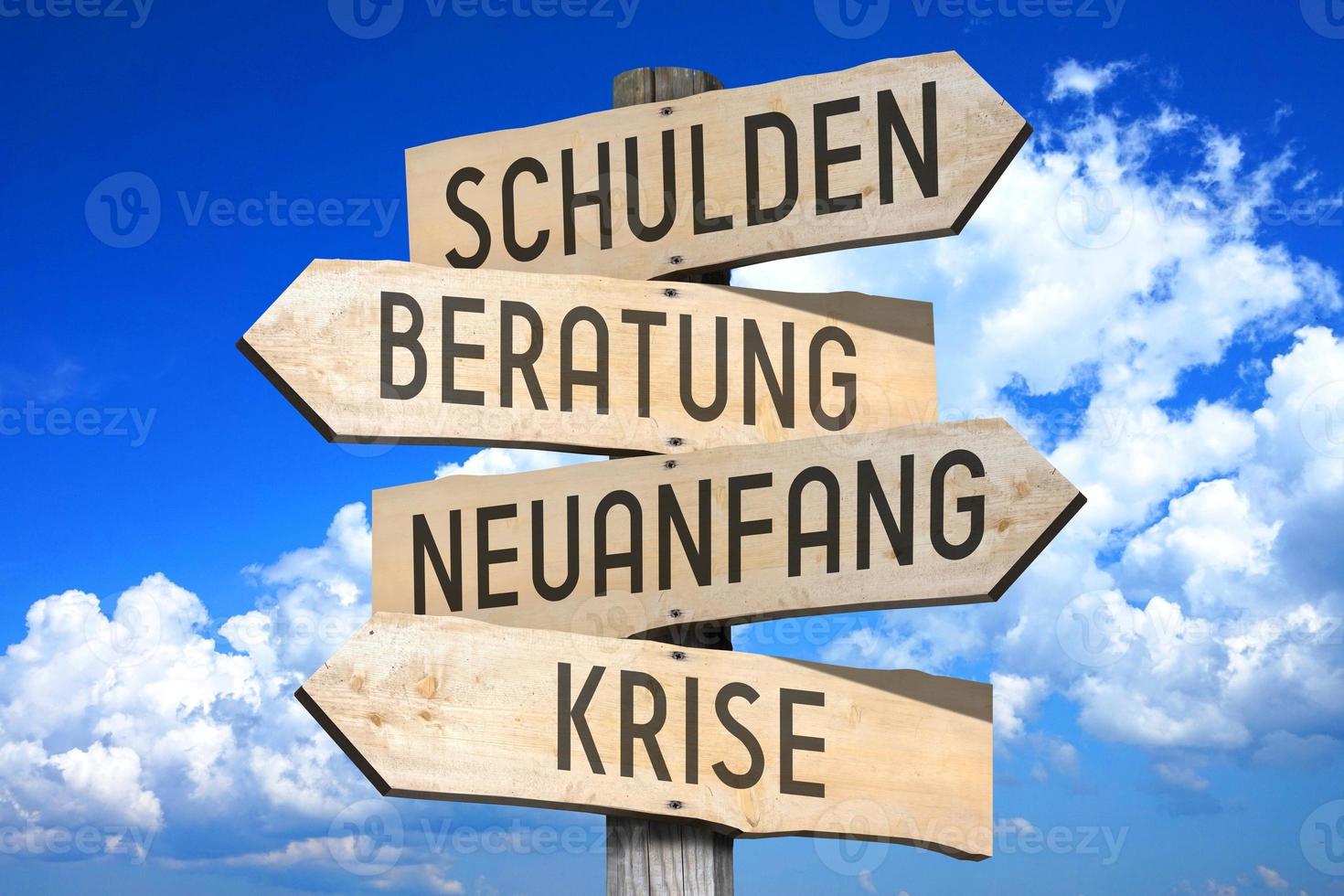 Debt, Help, New Beginning, Crisis in German - Wooden Signpost with Four Arrows photo